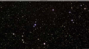 繁星點點的夜空，明亮的星星和暗淡的星星散落在黑暗的虛空中。 — 美學筆電 壁紙