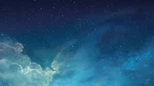 星空，有發光的藍色星雲和散落的星星。