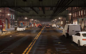 夜晚天橋下的城市街道，濕漉漉的路面和停泊的汽車。