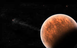 一顆紅色行星在星空宇宙背景和發光星雲的襯托下呈現剪影。