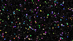一個黑色背景，充滿了彩色發光球體和類似星星的細小白色斑點。