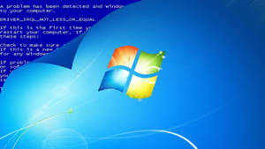Windows Vista 藍屏錯誤訊息，帶有彩色標誌和光漩渦。