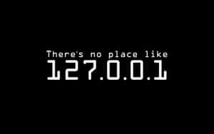 黑色背景上的白色數位文字顯示「There's no place like 127.0.0.1」