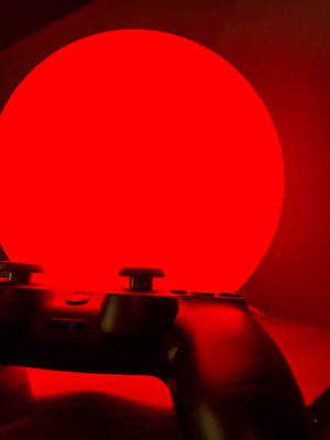黑色索尼DualShock 4無線控制器的紅色壁紙