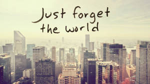 城市天際線，帶有文字疊加，顯示「Just forget the world」