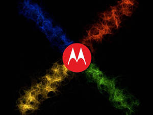 Motorola 標誌，彩色能量流從黑色背景中心向外輻射。 — 美學手機GIF 壁紙