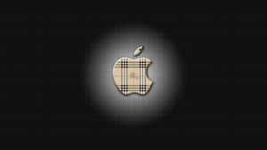 Apple標誌帶Burberry格子圖案在深色背景上發光