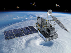 衛星在地球上空的軌道上，太陽能板展開。