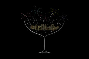 一個雞尾酒杯，包含城市天際線，上方有煙火爆炸。 — 煙火 壁紙