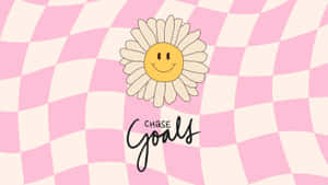 一朵微笑的雛菊花，在粉紅和奶油色棋盤背景上有「Chase Goals」文字。