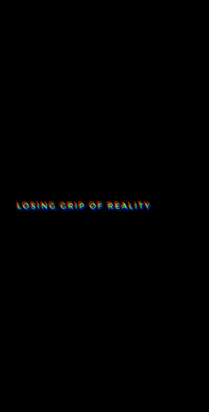 在黑色背景上顯示故障彩虹文字「losing grip of reality」 — Pixel Fold 壁紙