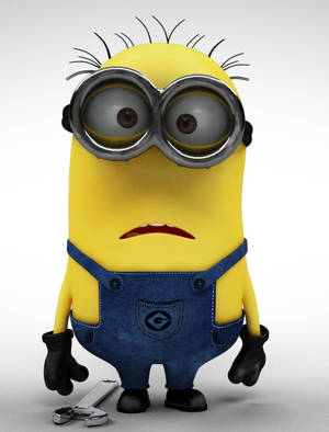 一個穿著藍色工裝褲的黃色卡通Minion拿著扳手。 — 彼思 壁紙