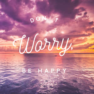 寧靜海洋日落配上勵志文字 don't worry be happy