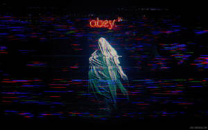 數位故障藝術中的兜帽人物，上方有 obey 字樣。