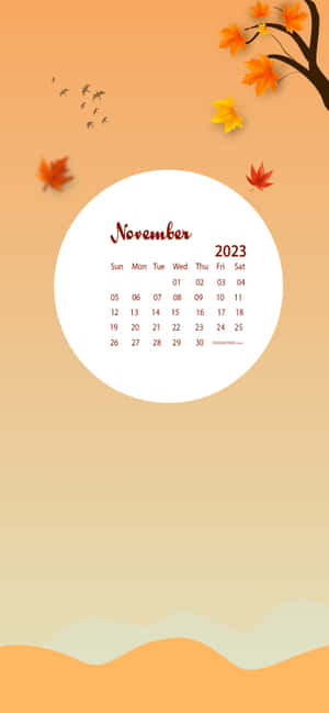 2023年11月月曆，帶有秋葉和鳥兒，背景為溫暖的漸變色。