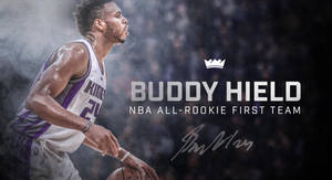Buddy Hield 身穿帝王隊球衣手持籃球，帶有 All-Rookie First Team 文字。