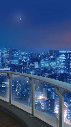 陽台景觀：夜晚城市燈光與新月 — 天際線 壁紙