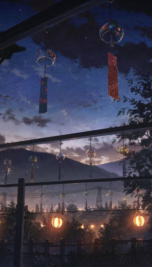 風鈴和燈籠在繁星點點的夜空下，籠罩著霧氣的城市和山巒之上閃耀。 — 動畫手機GIF 壁紙