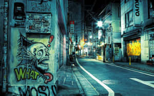 夜晚小巷，有骷髏塗鴉壁畫和發光的霓虹燈招牌。 — 唐人街 GIF 壁紙