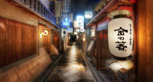 夜晚狹窄的日本小巷，被發光的燈籠和霓虹燈招牌照亮。