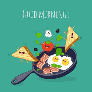 帶有笑臉的卡通早餐食物從平底鍋中跳出，帶有「GOOD MORNING!」文字。 — 班戟 壁紙
