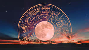 日落地平線上有月亮和星星的星座輪 — 星座 壁紙