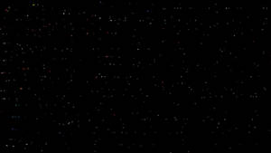 繁星點點的夜空，充滿了色彩繽紛的閃爍星星，背景為黑色。