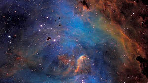 廣闊的宇宙場景，深空中色彩繽紛的星雲和閃爍的星星。