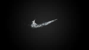 在深色背景上由水滴組成的Nike勾號標誌