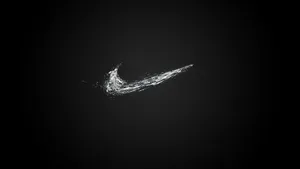 在深色背景上由水滴組成的Nike勾號標誌