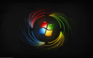 Windows 標誌在黑色背景上被彩色發光光跡環繞。