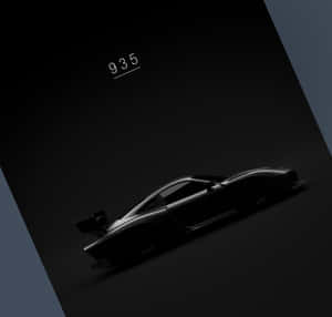 一輛黑色跑車在深色漸變背景上帶有發光點綴，數字935在上方。 — 酷車 壁紙