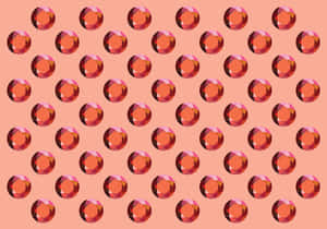 牆紙，桃色背景上重複的紅色寶石圖案 — 珠寶 GIF 壁紙