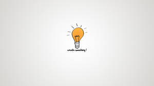 一個簡單的發光燈泡草圖，附有短語 create something!