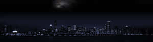 夜晚的城市天際線，燈火通明的建築物和星空。