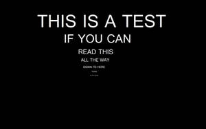 黑色背景上白色文字寫著「THIS IS A TEST IF YOU CAN READ THIS ALL THE WAY DOWN TO HERE PLEASE。」