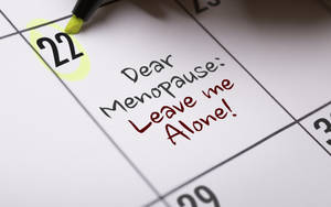 日曆日期22，附有手寫備註寫著Dear Menopause Leave me Alone!