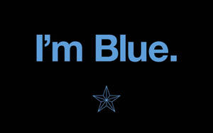 藍色文字寫著「I'm Blue」，下方有一顆藍色星星，背景黑色。 — 藍色 壁紙