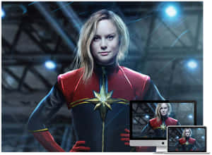 Captain Marvel 穿著她的超級英雄服裝，出現在電腦顯示器和筆記型電腦螢幕上。