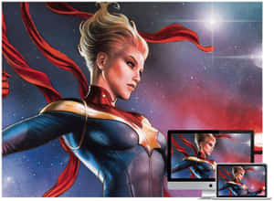 Captain Marvel 在太空中披著紅色斗篷，顯示在兩個電腦顯示器上。