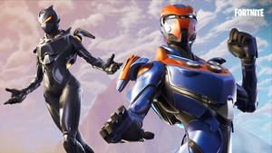 兩個穿著未來盔甲的Fortnite角色在群山天空背景下擺姿勢。