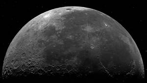 月球表面有隕石坑和星星 — 霓虹月亮 壁紙