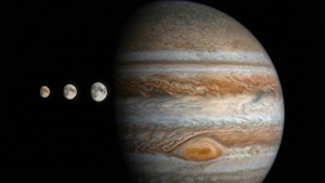 木星與三顆衛星在太空中排列，黑色背景