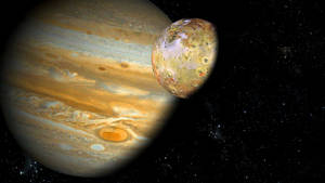 木星及其衛星伊奧在繁星點點的宇宙中運行。