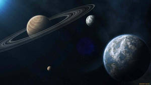 包括土星和地球在內的行星漂浮在滿是星星的宇宙場景中。