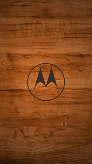 木紋背景上的Motorola標誌 — Motorola 壁紙
