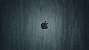 拉絲金屬背景上的Apple標誌