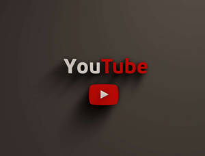 YouTube 標誌，紅色播放按鈕在深灰色背景上