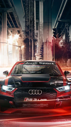 夜間停放在城市立交橋下的紅色Audi RS 3 LMS賽車。