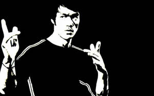 李小龍的黑白剪影做出搖滾手勢。